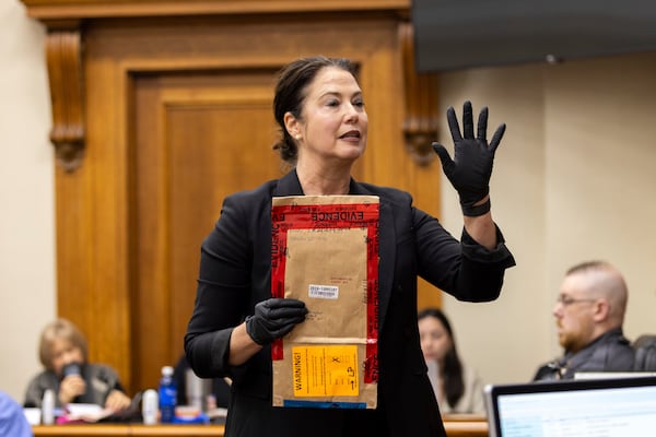 Prosecutor Sheila Ross speaks while holding an evidence bag during the trial for Jose Ibarra at the Athens-Clarke County Superior Court on Monday, Nov. 18, 2024, in Athens, Ga. (Arvin Temkar/Atlanta Journal-Constitution via AP, Pool)