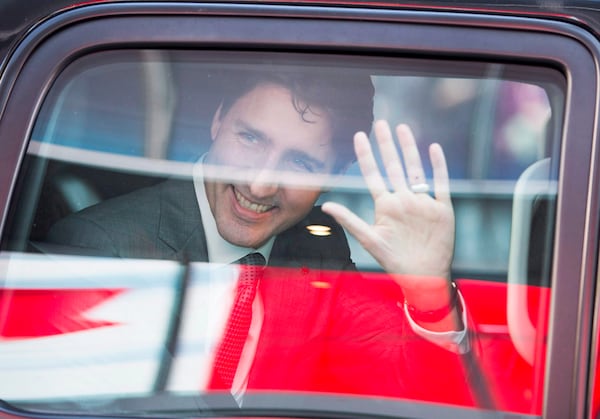 FILE - Prime Minister Justin Trudeau waves as he leaves the offices of Salesforce on Feb. 8, 2018, in San Francisco. (Ryan Remiorz/The Canadian Press via AP, File)