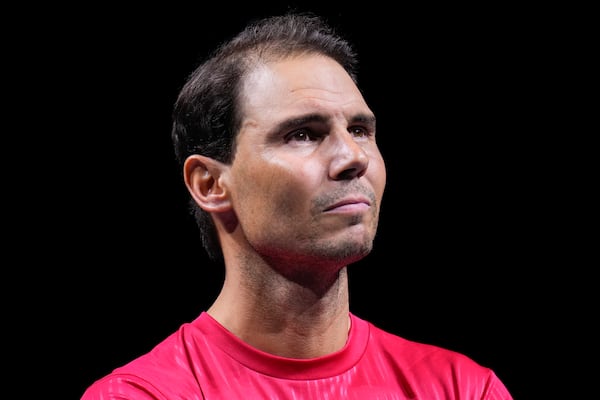 Spain's Rafael Nadal during a tribute after playing his last match as a professional tennis player in the Davis Cup quarterfinals at the Martin Carpena Sports Hall in Malaga, southern Spain, on early Wednesday, Nov. 20, 2024. (AP Photo/Manu Fernandez)