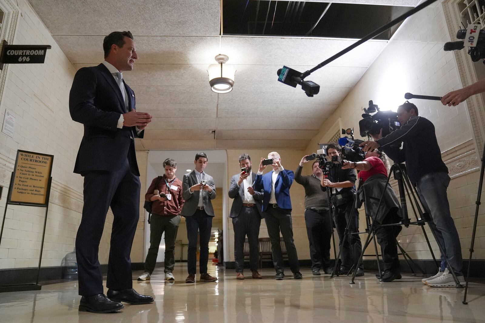 America PAC lawyer Chris Gober speaks with members of the media ahead of a hearing at a City Hall courtroom in Philadelphia, Monday, Nov. 4, 2024. (AP Photo/Matt Rourke)