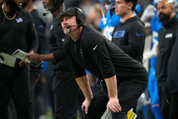 Detroit Lions head coach Dan Campbell watches against the Washington Commanders during the second half of an NFL football divisional playoff game, Saturday, Jan. 18, 2025, in Detroit. (AP Photo/Seth Wenig)