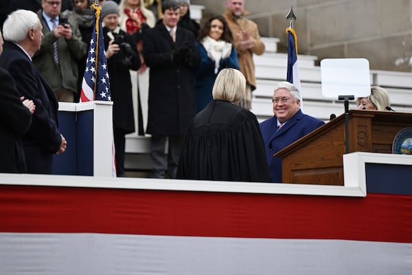 West Virginia Gov. Patrick Morrisey is sworn in at the state capitol in Charleston, W.Va., on Friday, Jan. 13, 2025. (AP Photo/Chris Jackson)