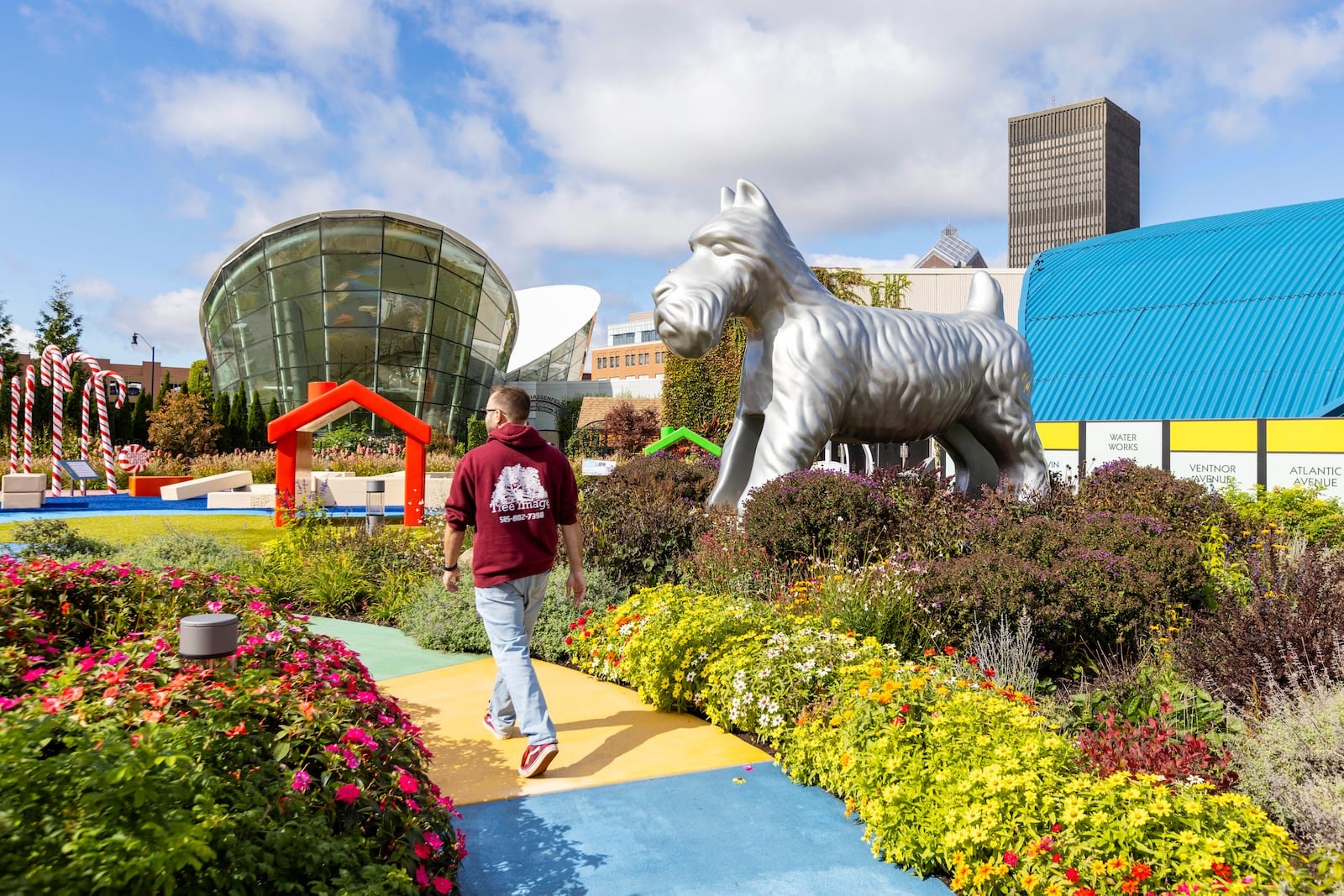 A visitor walks through the outdoor Hasbro Game Park at The Strong National Museum of Play, Tuesday, Oct. 15, 2024, in Rochester, N.Y. (AP Photo/Lauren Petracca)