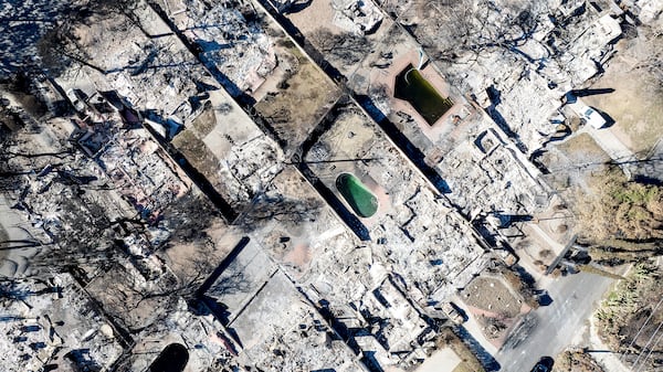 Residences destroyed by the Eaton Fire line a neighborhood in Altadena, Calif., on Tuesday, Jan. 21, 2025. (AP Photo/Noah Berger)