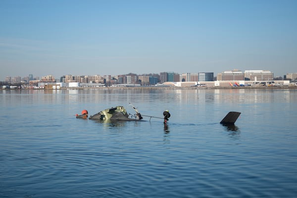 In this image provided by the U.S. Coast Guard, wreckage is seen in the Potomac River near Ronald Reagan Washington National Airport, Thursday, Jan. 30, 2025 in Washington. (Petty Officer 1st Class Brandon Giles, U.S. Coast Guard via AP)