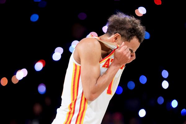 Atlanta Hawks guard Trae Young reacts after missing a 3-point basket during the second half of a semifinal game against the Milwaukee Bucks in the NBA Cup basketball tournament Saturday, Dec. 14, 2024, in Las Vegas. (AP Photo/Ian Maule)