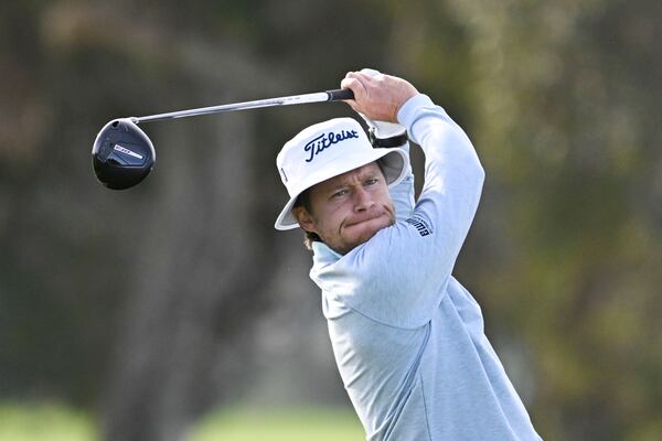 Peter Malnati hits his tee shot on the second hole of the North Course at Torrey Pines during the first round of the Farmers Insurance Open golf tournament Wednesday, Jan. 22, 2025, in San Diego. (AP Photo/Denis Poroy)