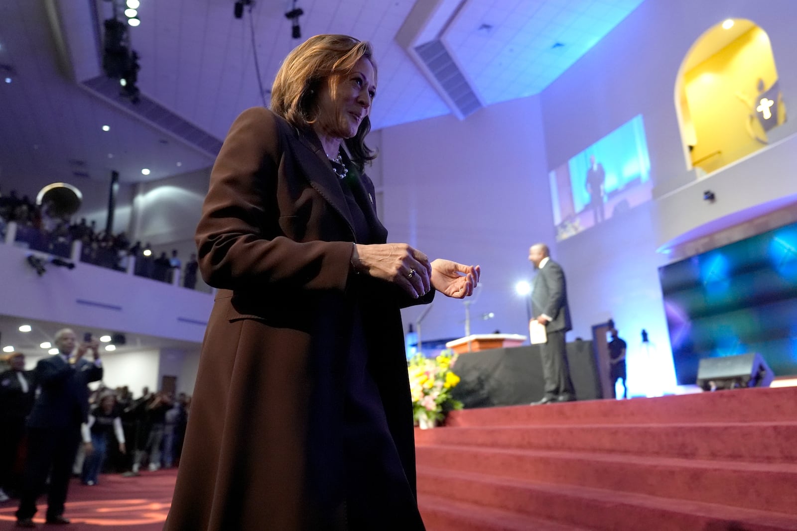 Democratic presidential nominee Vice President Kamala Harris walks to speak during a service at the Church of Christian Compassion, Sunday, Oct. 27, 2024, in Philadelphia. (AP Photo/Susan Walsh)