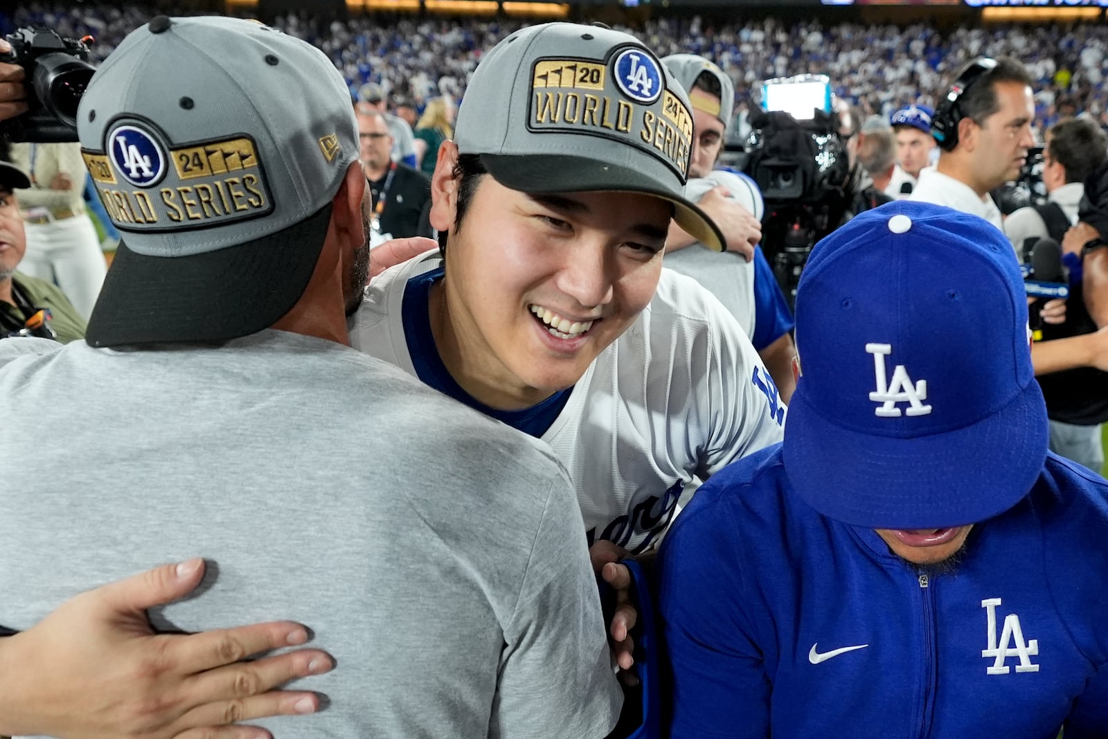 Los Angeles Dodgers' Shohei Ohtani celebrates after their win against the New York Mets in Game 6 of a baseball NL Championship Series, Sunday, Oct. 20, 2024, in Los Angeles. The Dodgers will face the New York Yankees in the World. (AP Photo/Ashley Landis)