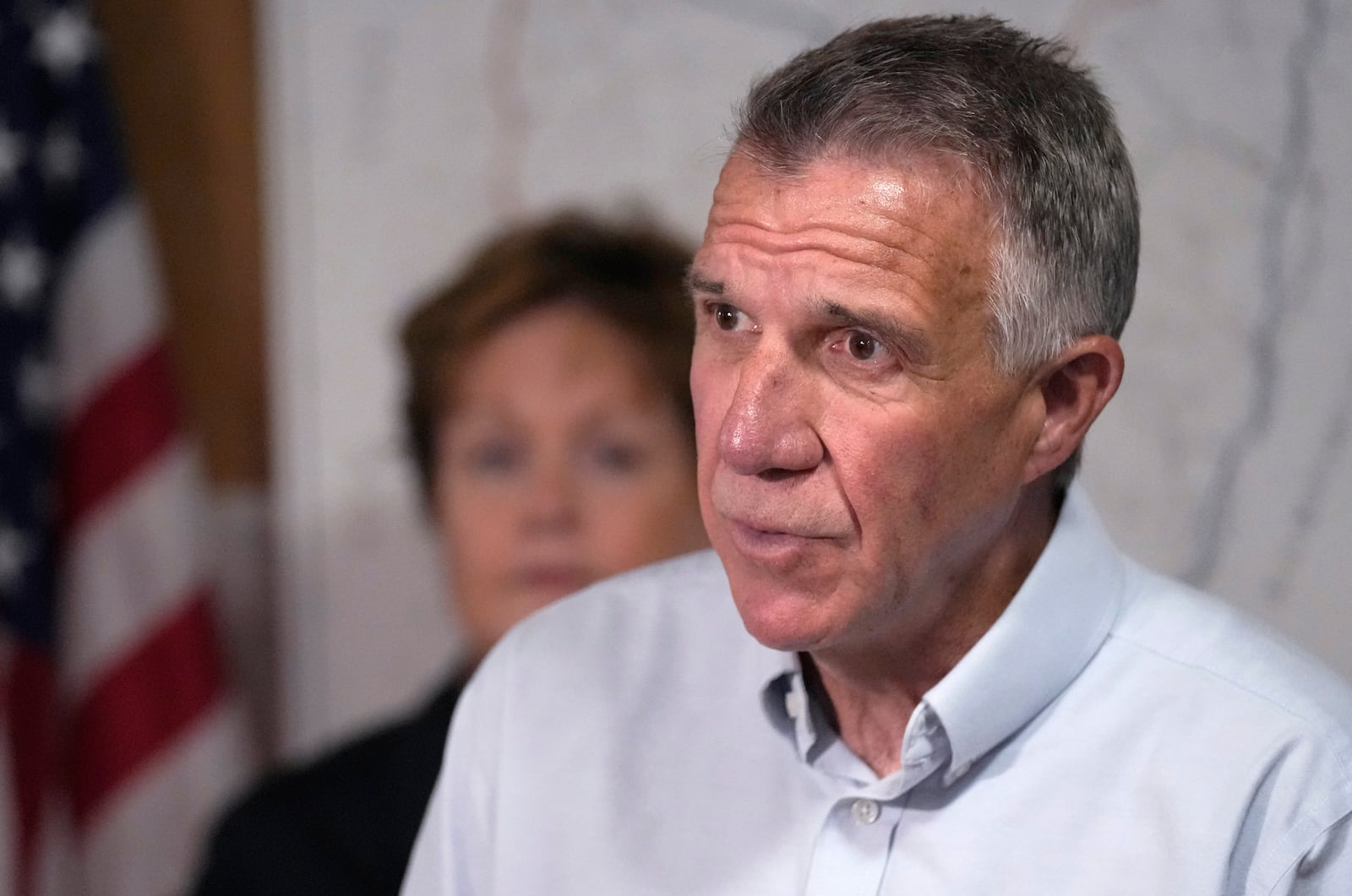 FILE — Gov. Phil Scott updates reporters after remnants of Hurricane Beryl caused flooding and destruction across Vermont during a news conference, July 12, 2024, in Berlin, Vt. (AP Photo/Charles Krupa, File)