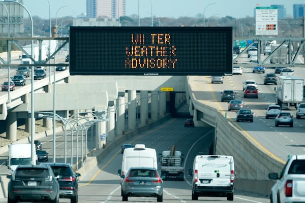 A sign warns drivers of a winter storm expected to hit the North Texas region tomorrow in Dallas, Wednesday, Jan. 8, 2025. (AP Photo/LM Otero)