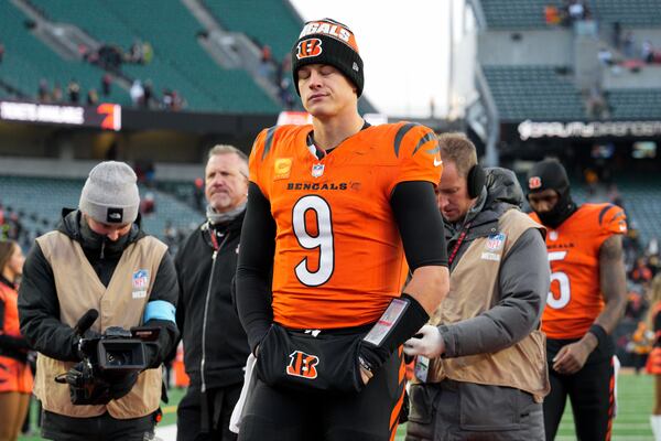 Cincinnati Bengals quarterback Joe Burrow (9) walks off the field after his team's loss to the Pittsburgh Steelers in an NFL football game Sunday, Dec. 1, 2024, in Cincinnati. (AP Photo/Jeff Dean)