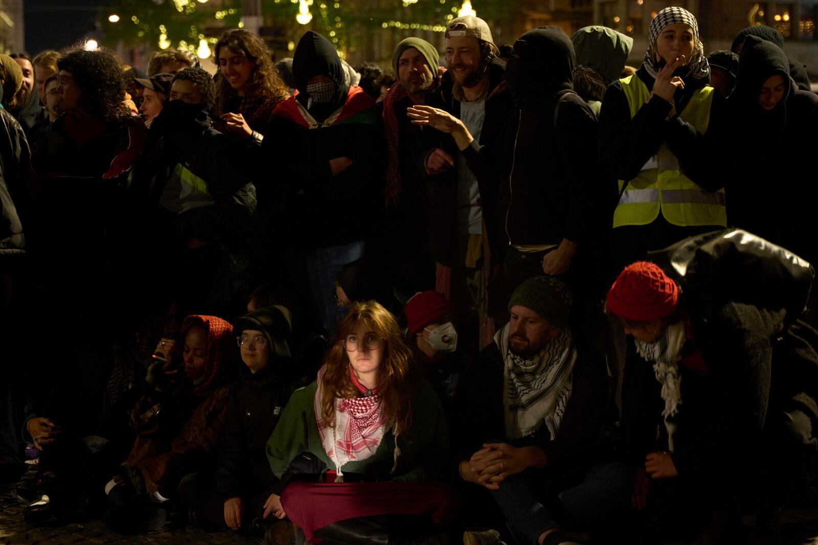 Pro-Palestinian supporters protest in Amsterdam, Netherlands, Wednesday, Nov. 13, 2024, despite a city ban on such gatherings. (AP Photo/Bram Janssen)