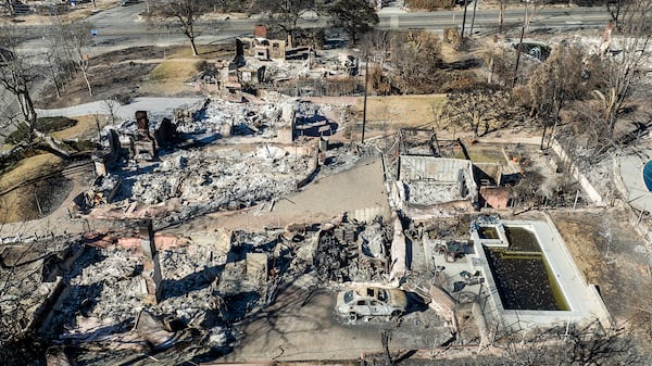 Residences destroyed by the Eaton Fire line a neighborhood in Altadena, Calif., on Tuesday, Jan. 21, 2025. (AP Photo/Noah Berger)