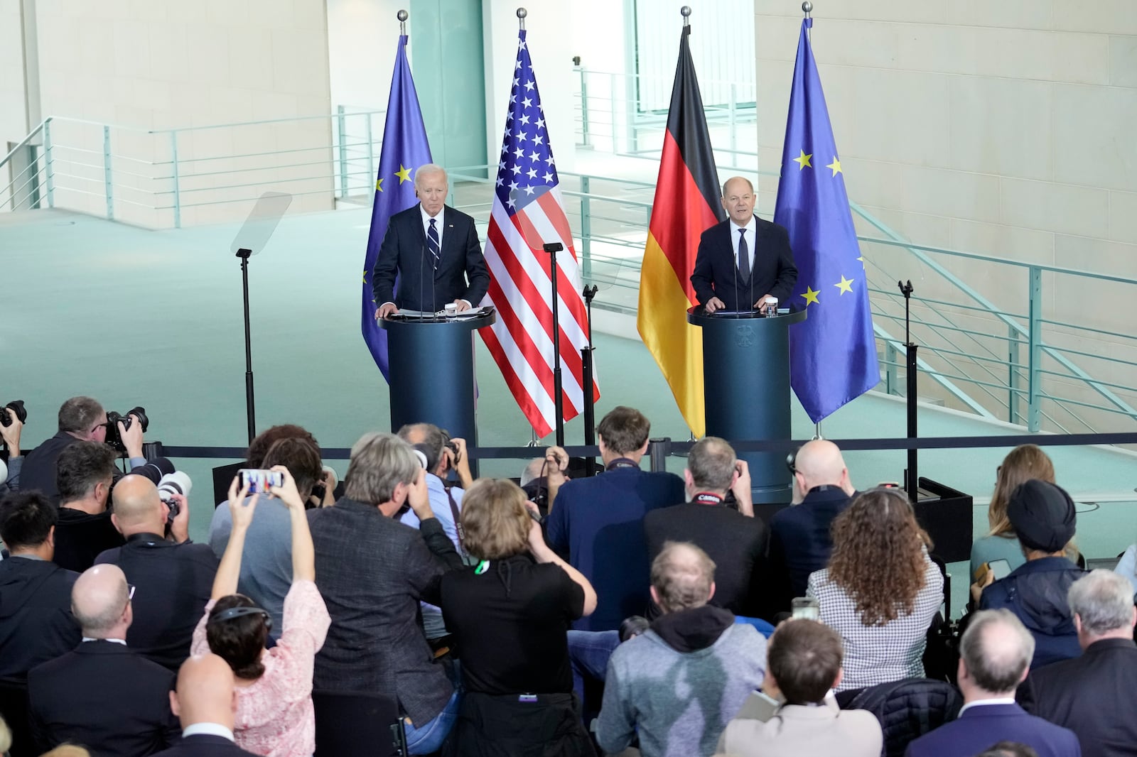 President Joe Biden and German Chancellor Olaf Scholz deliver joint statements to the press at the Chancellery in Berlin, Germany, Friday, Oct. 18, 2024. (AP Photo/Ebrahim Noroozi)