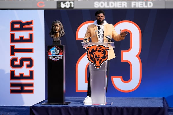 Former Chicago Bears Devin Hester speaks during a halftime ceremony of an NFL football game between the Chiicago Bears and Green Bay Packers Sunday, Nov. 17, 2024, in Chicago. (AP Photo/Charles Rex Arbogast)