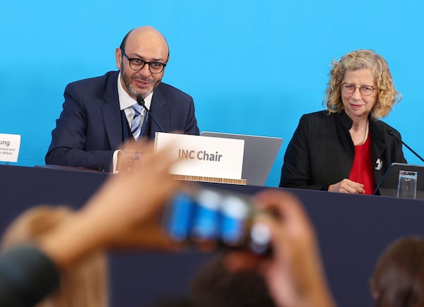 Chair of the International Negotiating Committee, Luis Vayas Valdivieso, left, and Inger Andersen, Executive Director of UNEP, right, attend at the press conference for the fifth session of the Intergovernmental Negotiating Committee on Plastic Pollution in Busan, South Korea, Monday, Nov. 25, 2024. (Son Hyung-joo/Yonhap via AP)