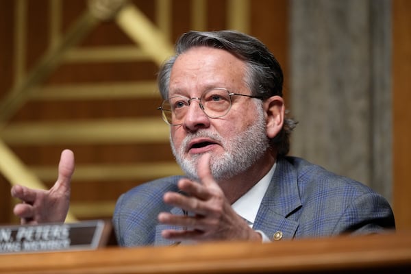 Ranking Member Gary Peters, D-Mich., speaks at the Senate Homeland Security and Governmental Affairs Committee confirmation hearing for South Dakota Gov. Kristi Noem, President-elect Donald Trump's nominee to be Secretary of Homeland Security, at the Capitol in Washington, Friday, Jan. 17, 2025. (AP Photo/Ben Curtis)