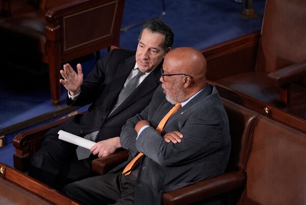 Rep. Jamie Raskin, D-Md., left, and Rep. Bennie Thompson, D-Miss., who chaired the House committee that investigated the Jan. 6, 2021, attack on the Capitol, confer in the House chamber as lawmakers gather for a joint session of Congress to certify the votes from the Electoral College in the presidential election, in Washington, Monday, Jan. 6, 2025. (AP Photo/J. Scott Applewhite)