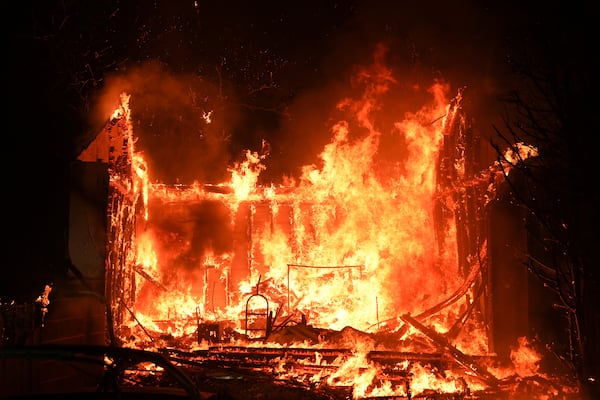 A structure is burned by the Palisades Fire in the Pacific Palisades neighborhood of Los Angeles, Thursday, Jan. 9, 2025. (AP Photo/Jae C. Hong)