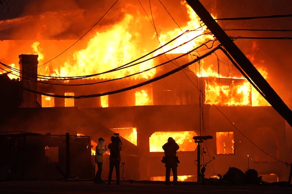 Beach front homes are destroyed by the Palisades Fire Wednesday, Jan. 8, 2025 in Malibu, Calif. (AP Photo/Mark J. Terrill)