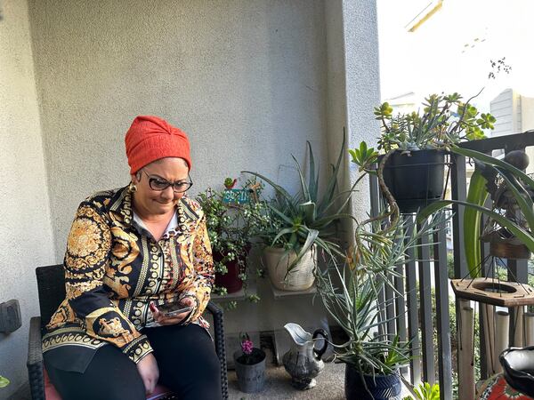 Dalyce Kelley pauses Tuesday, Jan. 14, 2025, while remembering her 95-year-old grandmother, Dalyce Curry, who died days earlier in the California wildfires. (AP Photo/Eugene Garcia)