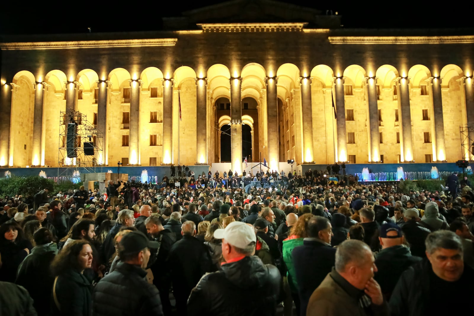 Demonstrators gather infront of Georgian Parliament building during an opposition protest against the results of the parliamentary election in Tbilisi, Georgia, Monday, Oct. 28, 2024. (AP Photo/Zurab Tsertsvadze)