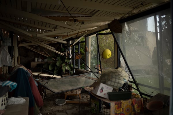 A damaged room of a house is seen in the Kibbutz Manara, which is located near to the border with Lebanon, in the northern Israel, Thursday, Nov. 28, 2024. (AP Photo/Leo Correa)