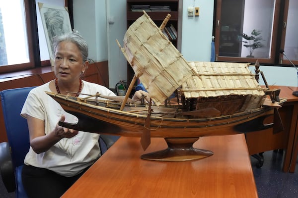 Narumon Arunotai, who works closely with the Moken and indigenous communities, speaks during an interview with The Associated Press, discussing the Kabang boat at Chualongkorn University in Bangkok, Thailand, Monday, Dec. 2, 2024. (AP Photo/Sakchai Lalit)