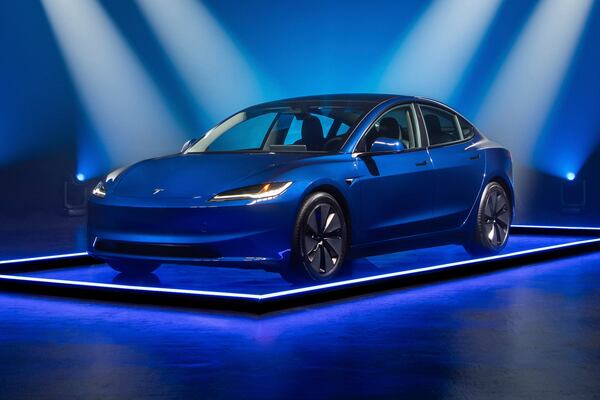 This photo provided by Edmunds shows the 2025 Tesla Model 3. The Model 3's recently improved interior, long range and enjoyable performance help make it the Edmunds Top Rated Electric Car for 2025. (Courtesy of Edmunds via AP)