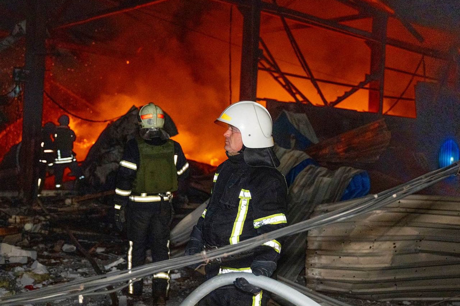 This photo, provided by head of the Odesa Regional Military Administration Oleh Kiper, firefighters work on the site of a damaged building after Russian attack in Odesa, Ukraine, early Friday, Nov. 8, 2024. (Telegram Channel of Odesa Region Governor Oleh Kiper via AP)