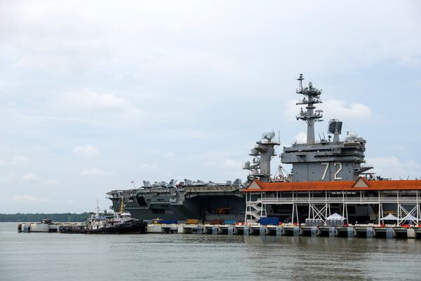 The Nimitz-class aircraft carrier USS Abraham Lincoln is docked during a media tour in Port Klang, on the outskirts of Kuala Lumpur, Malaysia, Tuesday, Nov. 26, 2024.(Fazry Ismail/Pool Photo via AP)