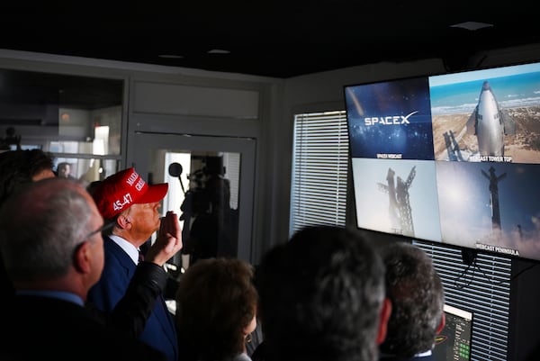 President-elect Donald Trump listens as Elon Musk explains the operations ahead of the launch of the sixth test flight of the SpaceX Starship rocket Tuesday, Nov. 19, 2024 in Brownsville, Texas. (Brandon Bell/Pool via AP)