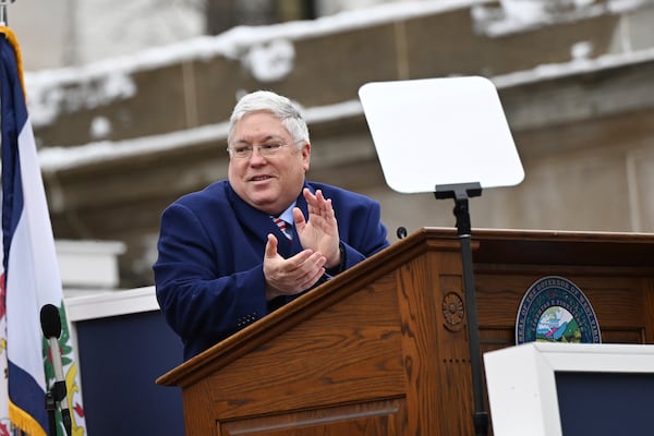 West Virginia Governor Patrick Morrisey applauds following his swearing in at the state capitol in Charleston, W.Va., on Monday, Jan. 13, 2025. (AP Photo/Chris Jackson)