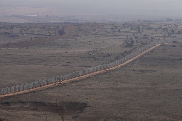 A general view of the fence near the so-called Alpha Line that separates the Israeli-controlled Golan Heights from Syria, Thursday, Dec. 12, 2024. (AP Photo/Matias Delacroix)