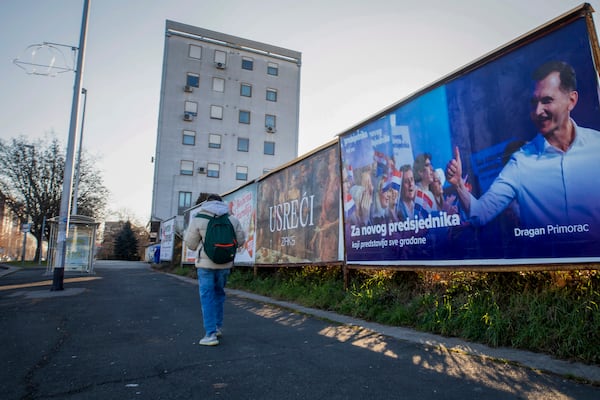 A campaign poster of residential candidate Dragan Primorac hangs ahead of the presidential election in Zagreb, Croatia, Thursday, Dec. 26, 2024. (AP Photo)