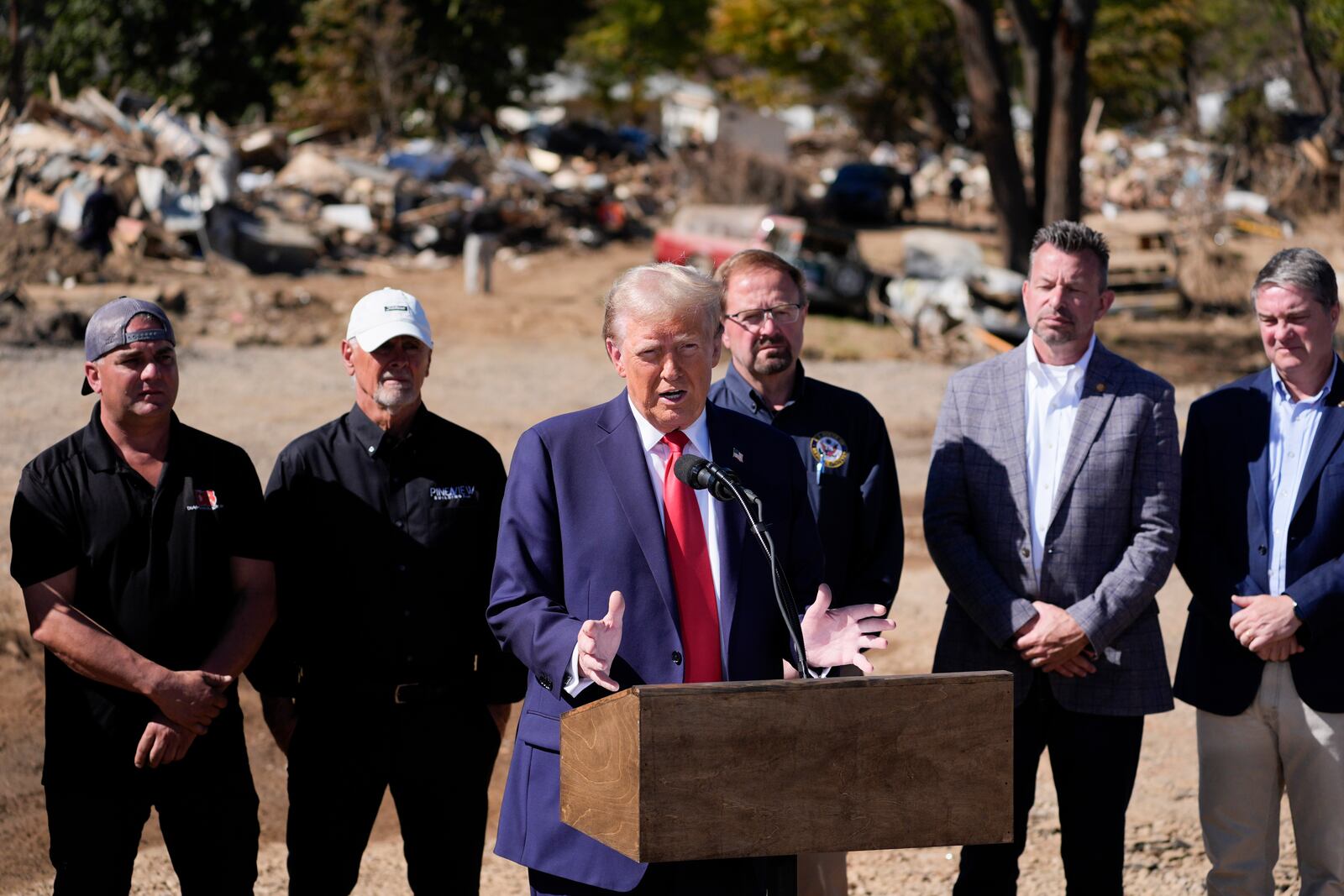 Republican presidential nominee former President Donald Trump delivers remarks on the damage and federal response to Hurricane Helene, Monday, Oct. 21, 2024, in Swannanoa, N.C. (AP Photo/Evan Vucci)