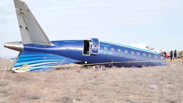 In this photo taken from a video released by the administration of Mangystau region, the wreckage of Azerbaijan Airlines Embraer 190 lies on the ground near the airport of Aktau, Kazakhstan, Wednesday, Dec. 25, 2024. (The Administration of Mangystau Region via AP)