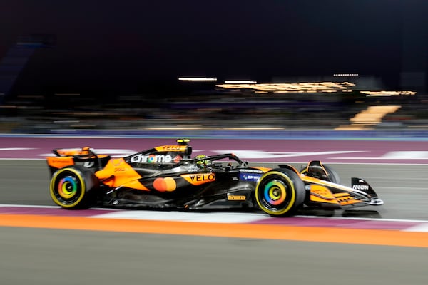 McLaren driver Lando Norris of Britain steers his car during sprint race at the Formula One Qatar Grand Prix, at the Lusail International Circuit in Lusail, Qatar, Saturday, Nov. 30, 2024. (AP Photo/ Darko Bandic)