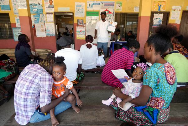 Women wait to have the malaria vaccine R21/Matrix-M administered to their children at the comprehensive Health Centre in Agudama-Epie, in Yenagoa, Nigeria, Monday, Dec. 9, 2024. (AP Photo/Sunday Alamba)