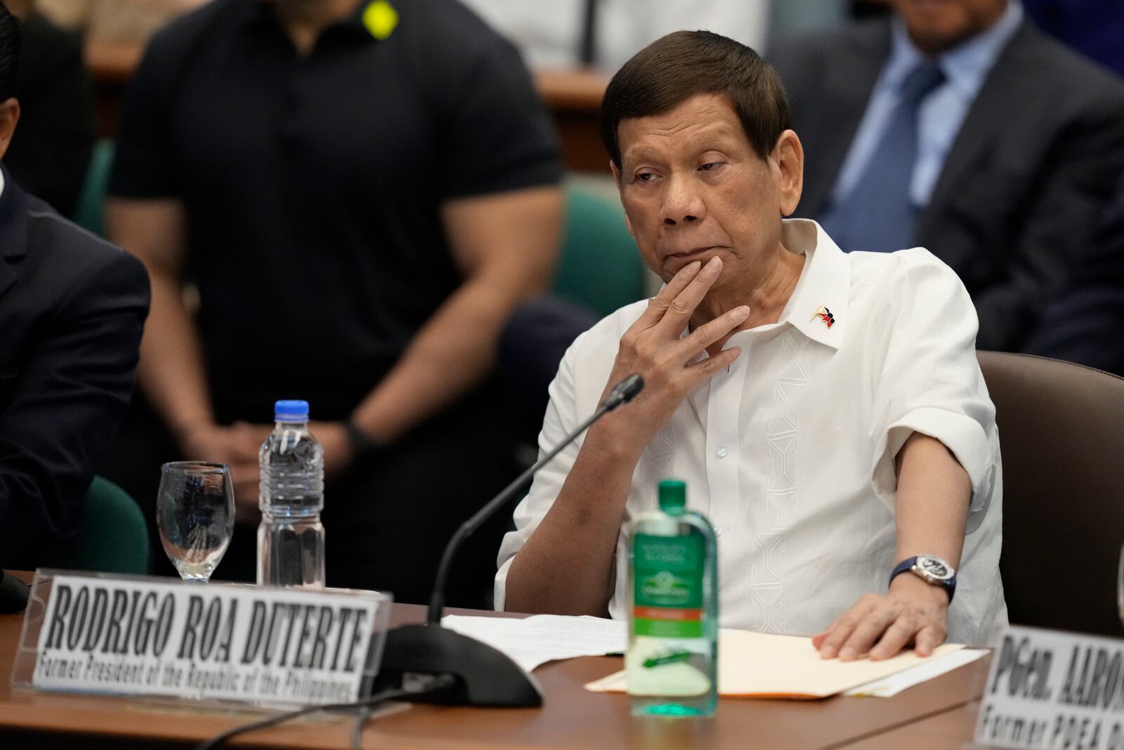 Former Philippine President Rodrigo Duterte listens during a senate inquiry on the so-called war on drugs during his administration at the Philippine Senate Monday, Oct. 28, 2024, in Manila, Philippines. (AP Photo/Aaron Favila)