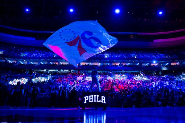 FILE - Philadelphia 76ers mascot Franklin waves the flag during pre-game introductions prior to the NBA basketball game against the Brooklyn Nets, April 14, 2024, in Philadelphia. (AP Photo/Chris Szagola, file)