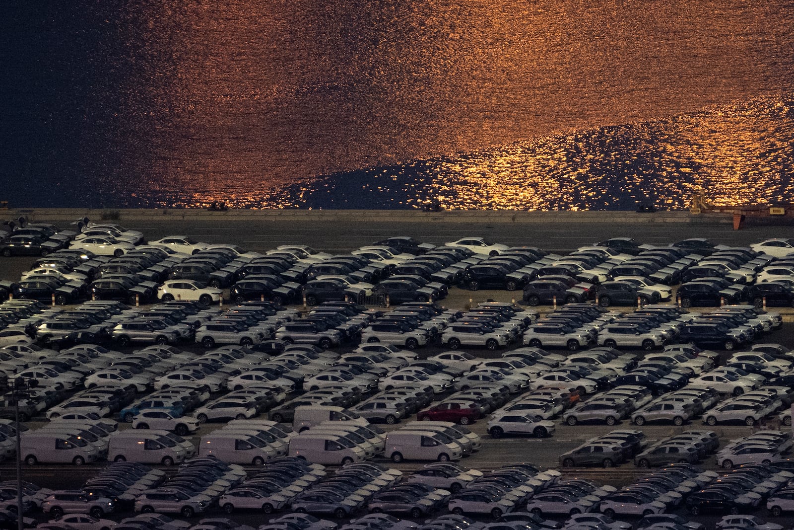 FILE - Cars sit at the port of Haifa, Israel, on Aug. 15, 2024. (AP Photo/Leo Correa, File)