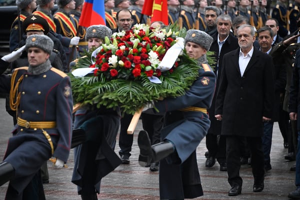 Iranian President Masoud Pezeshkian attends a laying ceremony at the Unknown Soldier near the Kremlin Wall in Moscow, Russia, Friday, Jan. 17, 2025. (Alexander Nemenov/Pool Photo via AP)