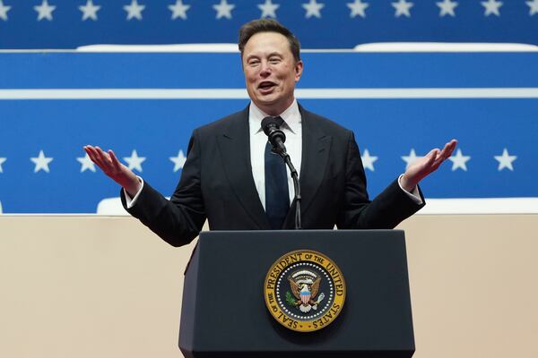 Elon Musk speaks at an indoor Presidential Inauguration parade event in Washington, Monday, Jan. 20, 2025. (AP Photo/Matt Rourke)