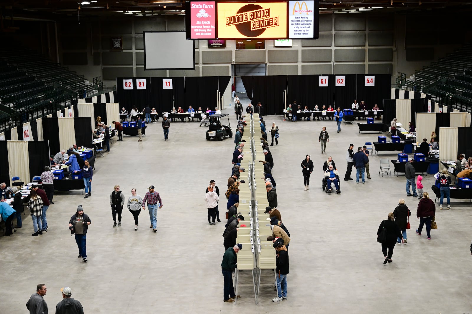 Voters cast their ballots at the Butte Civic Center in Butte, Mont., on Tuesday, Nov. 5, 2024. (AP Photo/Tommy Martino)