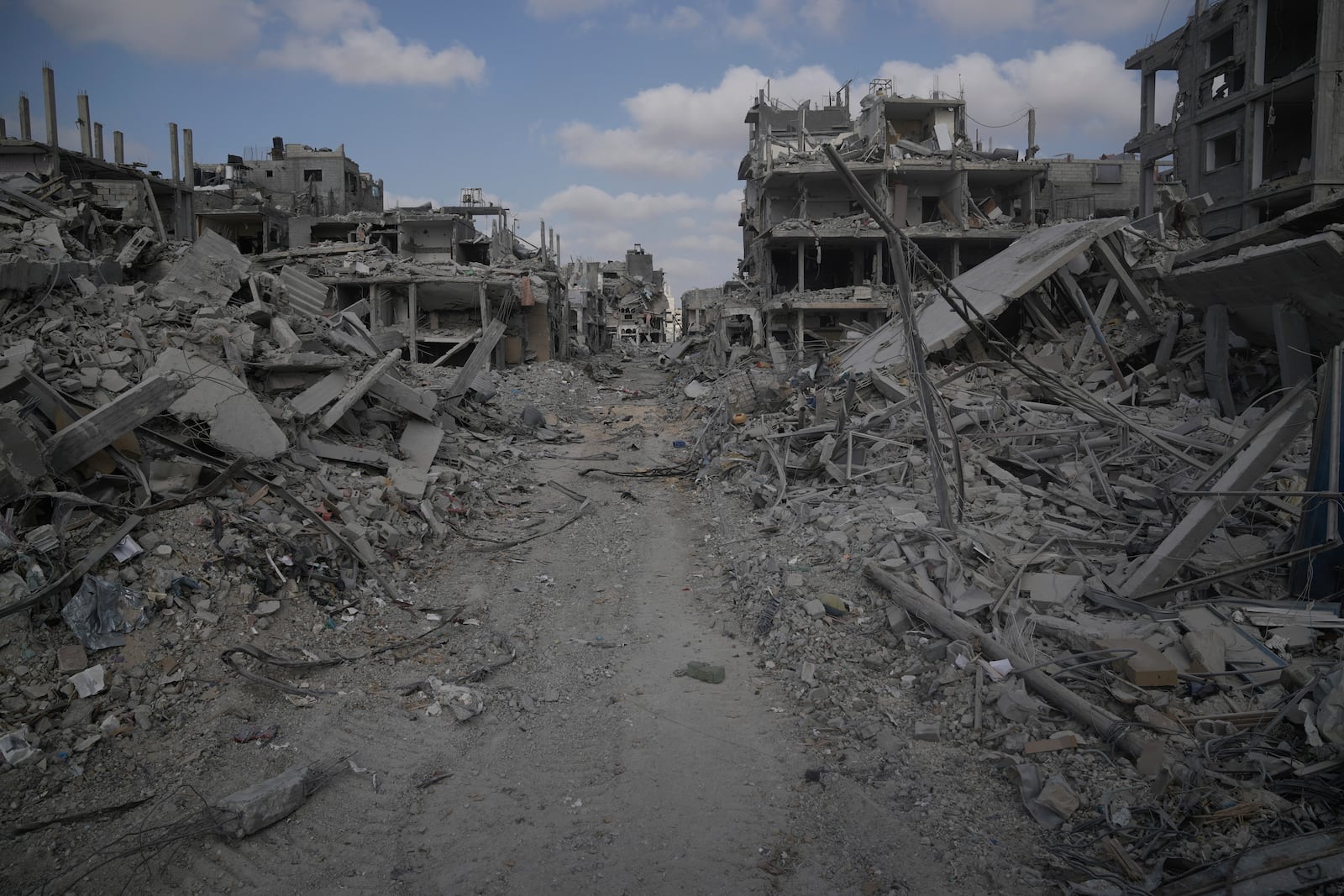 FILE - A view of destroyed buildings is shown following Israeli strikes in the southern Gaza Strip on Sept. 13, 2024. (AP Photo/Leo Correa, File)