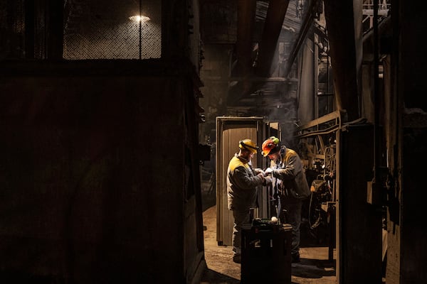 Worker repair equipment at DTEK's power plant after a recent Russian missile attack in Ukraine, Nov. 28, 2024. (AP Photo/Evgeniy Maloletka)