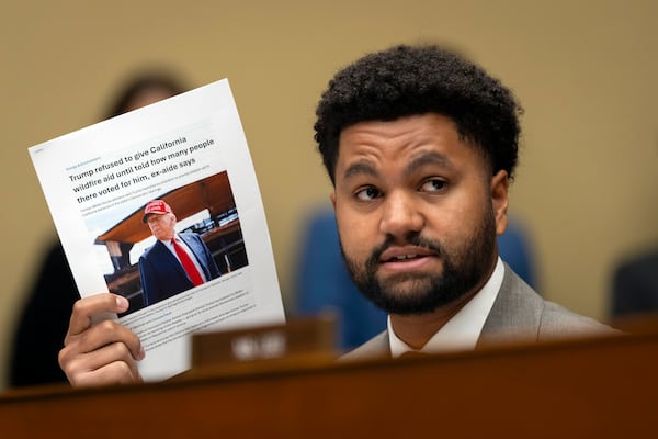 Rep. Maxwell Frost, D-Fla., addresses Administrator of the Federal Emergency Management Agency (FEMA) Deanne Criswell as she testifies in front a House Committee on Oversight and Accountability hearing on oversight of FEMA, on Capitol Hill in Washington, Tuesday, Nov. 19, 2024. (AP Photo/Ben Curtis)