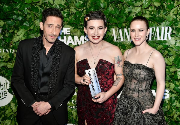 Director Vera Drew, center, poses with the breakthrough director award for "The People's Joker" with actors Adrien Brody, left, and Rachel Brosnahan during The Gothams Film Awards at Cipriani Wall Street on Monday, Dec. 2, 2024, in New York. (Photo by Evan Agostini/Invision/AP)